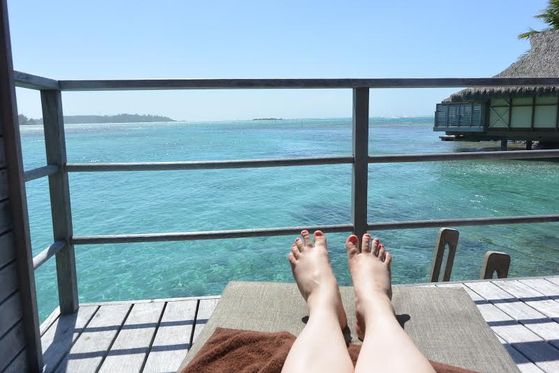 Someone had happy toes looking out their overwater bungalow!